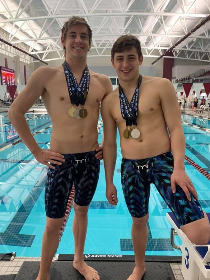 Seniors and teammates Max Meyers and Sam Hart competing in the 6a swimming state meet on February  