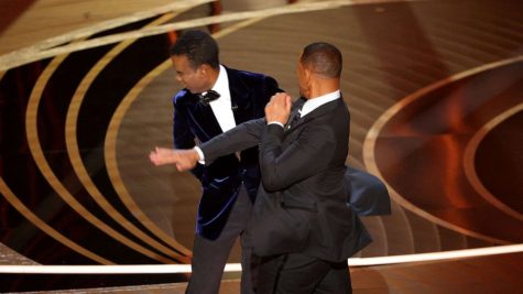 Smith slaps Rock across the face on stage at the 2022 Oscars.