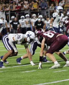 An EMHS Bulldogs faces off against a ENHS Husky. 