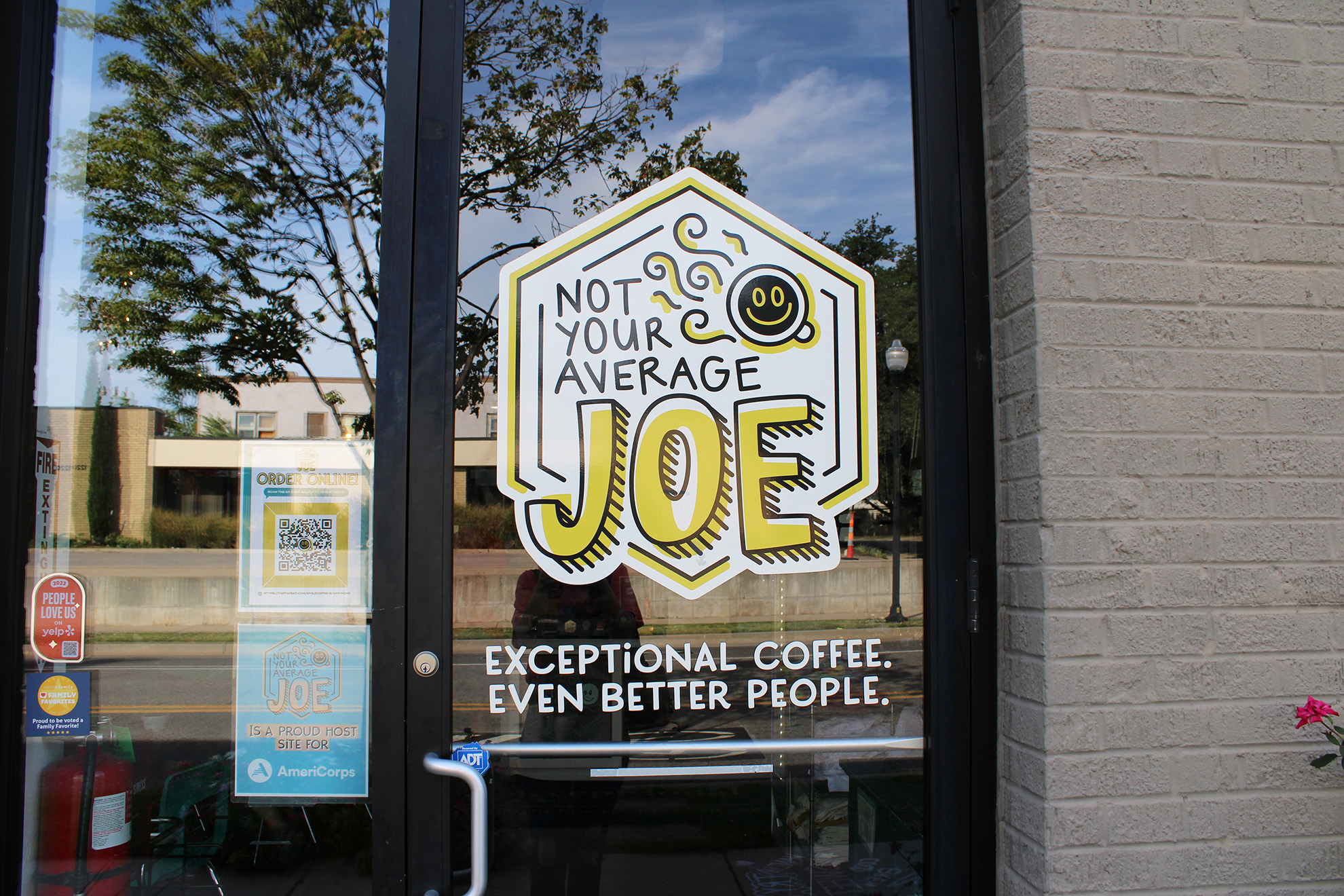 A local coffee shop has "Not Your Average Joe"