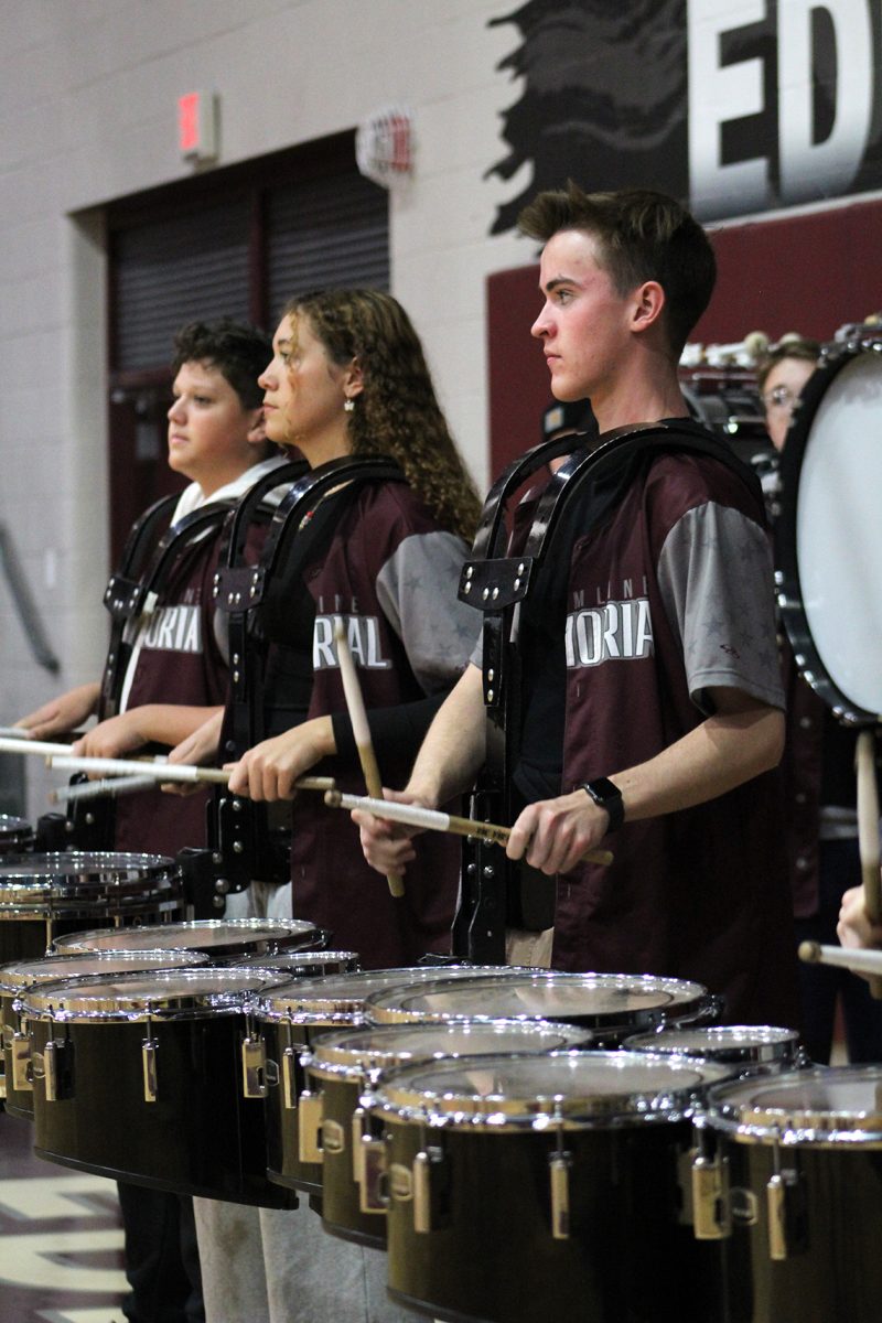 The EMHS drumline plays as students enter the gym for the assembly.