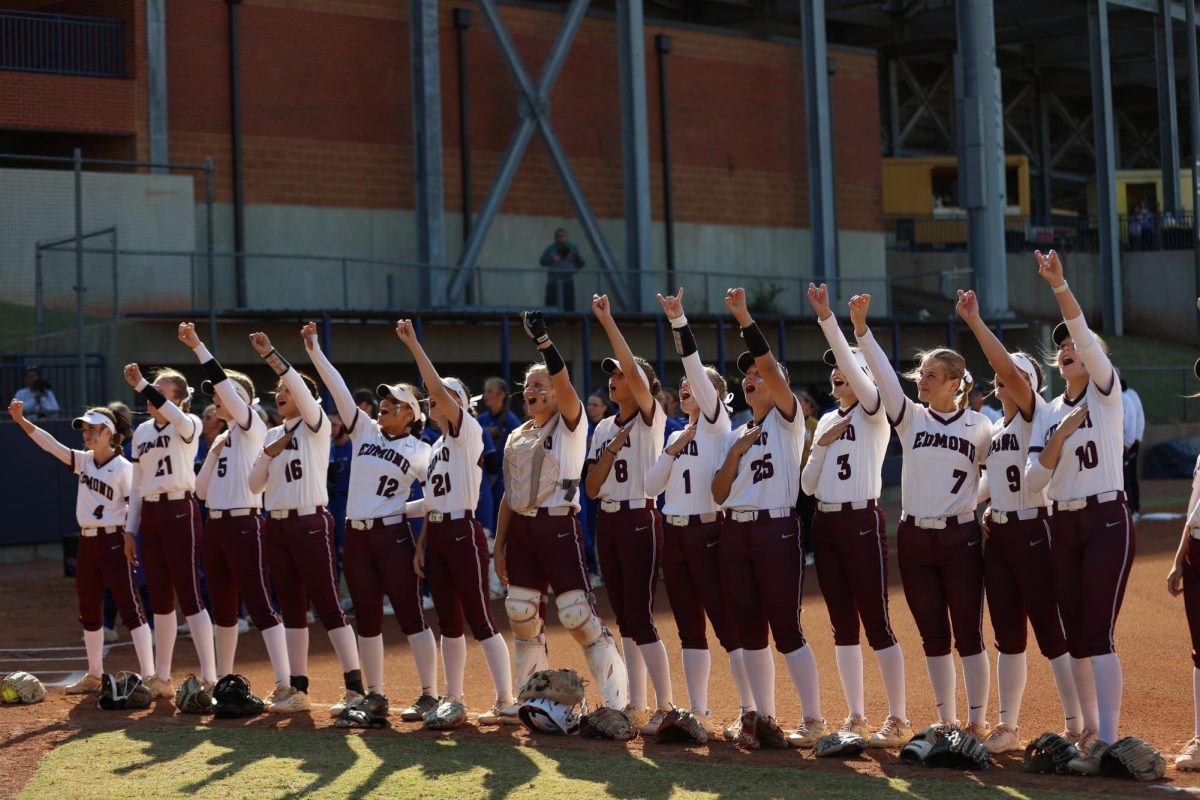 The Lady Bulldogs support their school by showing the "Bulldog."