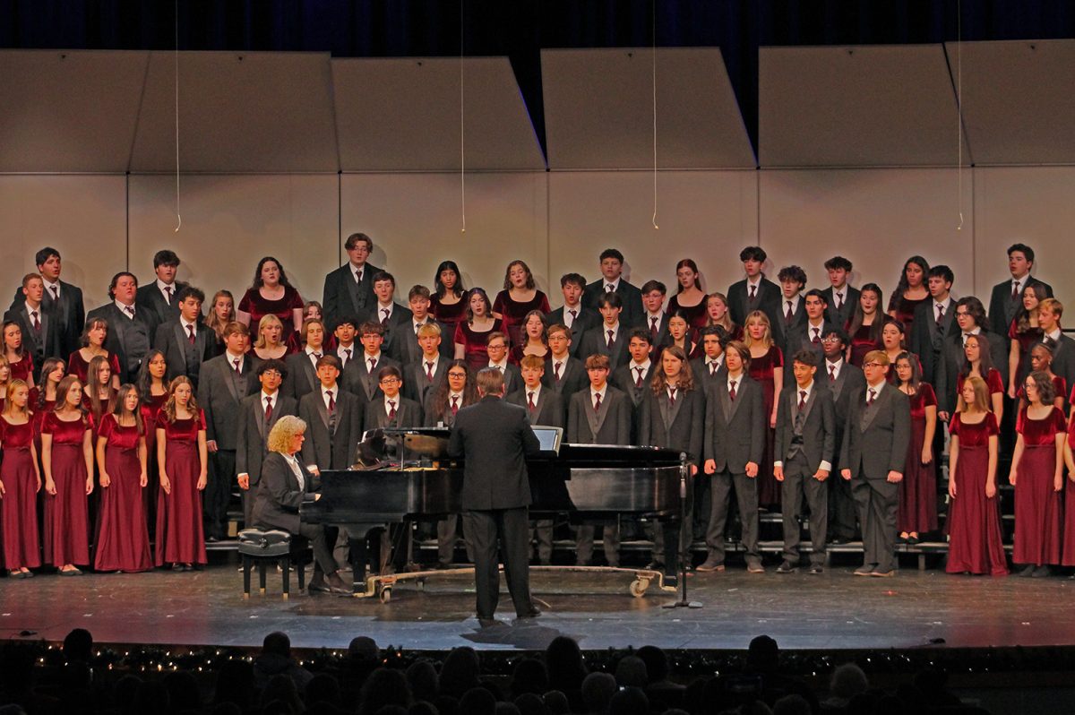 Every EMHS choir member joins together on stage to preform "Silent Night," an annual tradition at the winter concert.