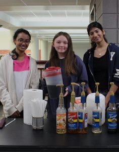 Members of the EMHS book club sell coffee during lunch.