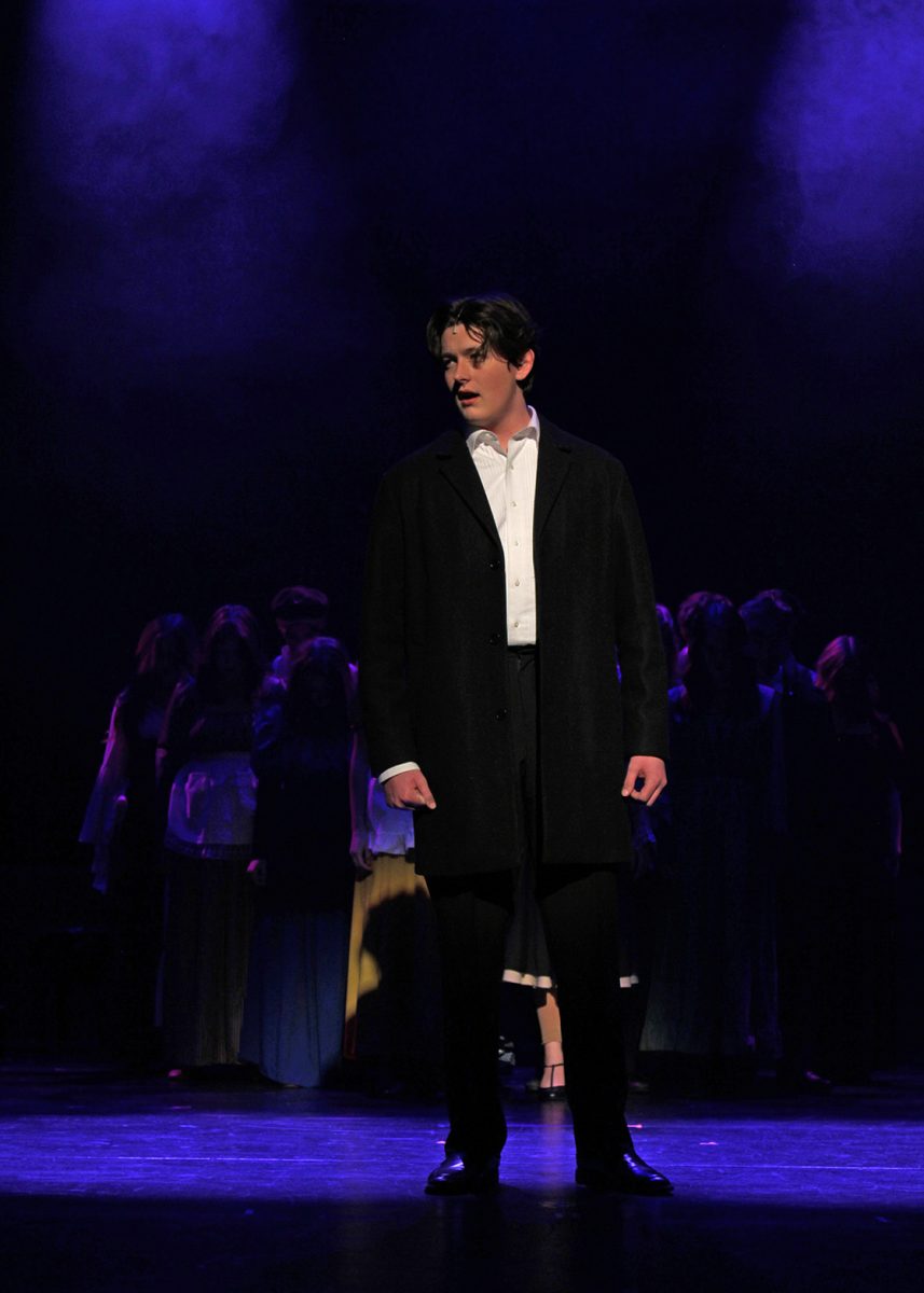 Colin Nye singing in the "Ballad of Sweeney Todd" performance.