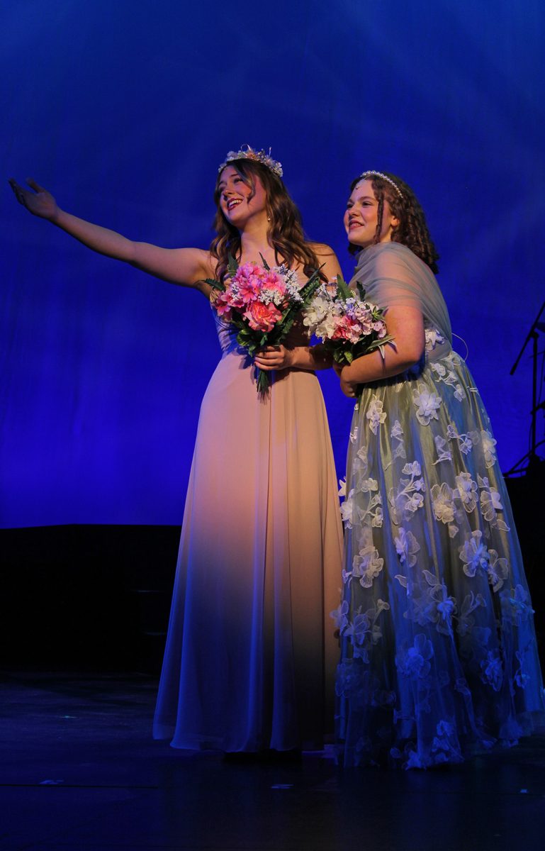 Olivia Hamlin and Reese Willming singing in "Flower Duet."