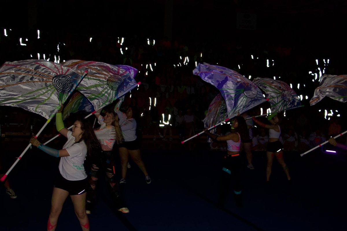 Memorial's color guard flew neon-painted flags in their first Techno assembly routine. 