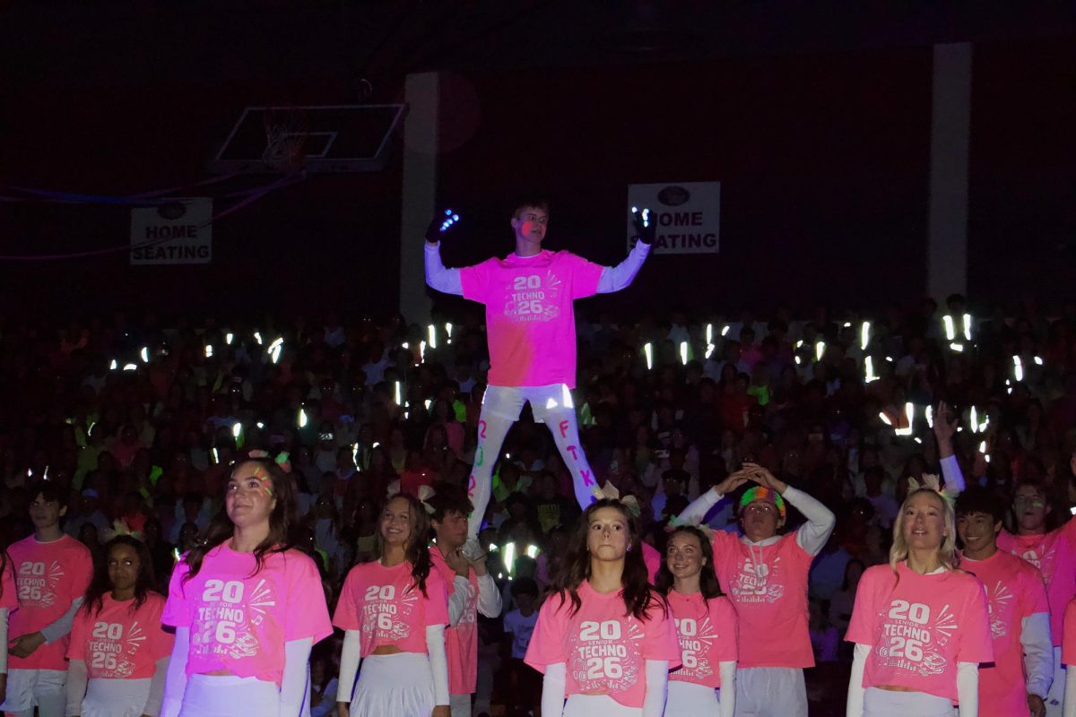 Bode Lashley stands triumphantly on the other seniors' shoulders, beginning the seniors' dance to "24K Magic" by Bruno Mars. 