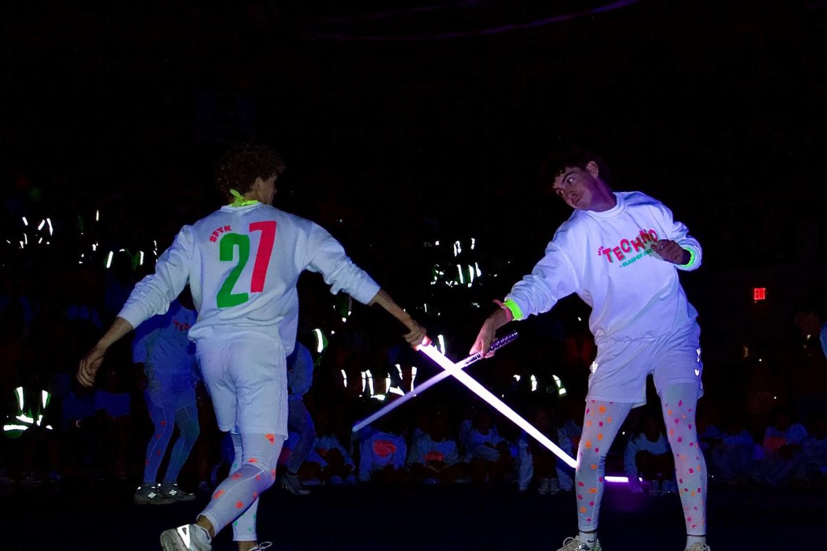 The juniors staged a choreographed lightsaber duel during their segment of the Techno assembly. 