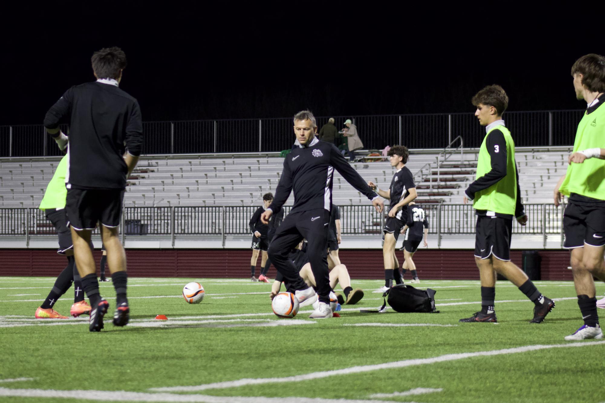 Varsity boys soccer versus Bishop McGuinness