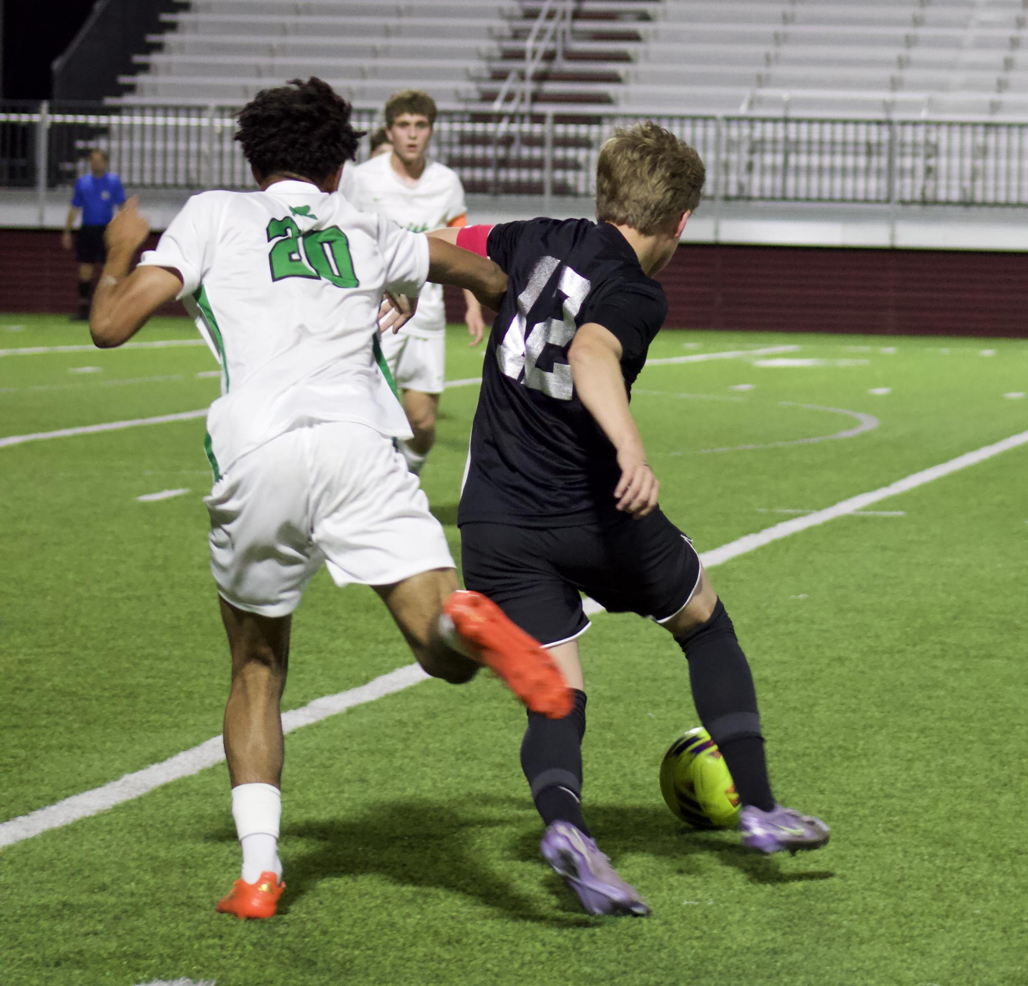 Varsity boys soccer versus Bishop McGuinness