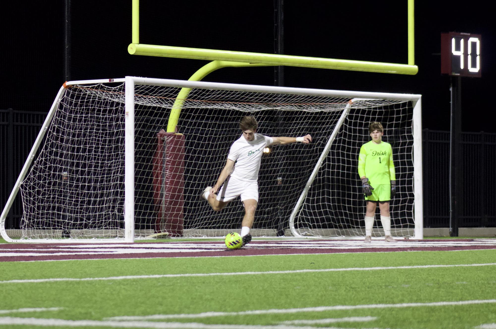 Varsity boys soccer versus Bishop McGuinness