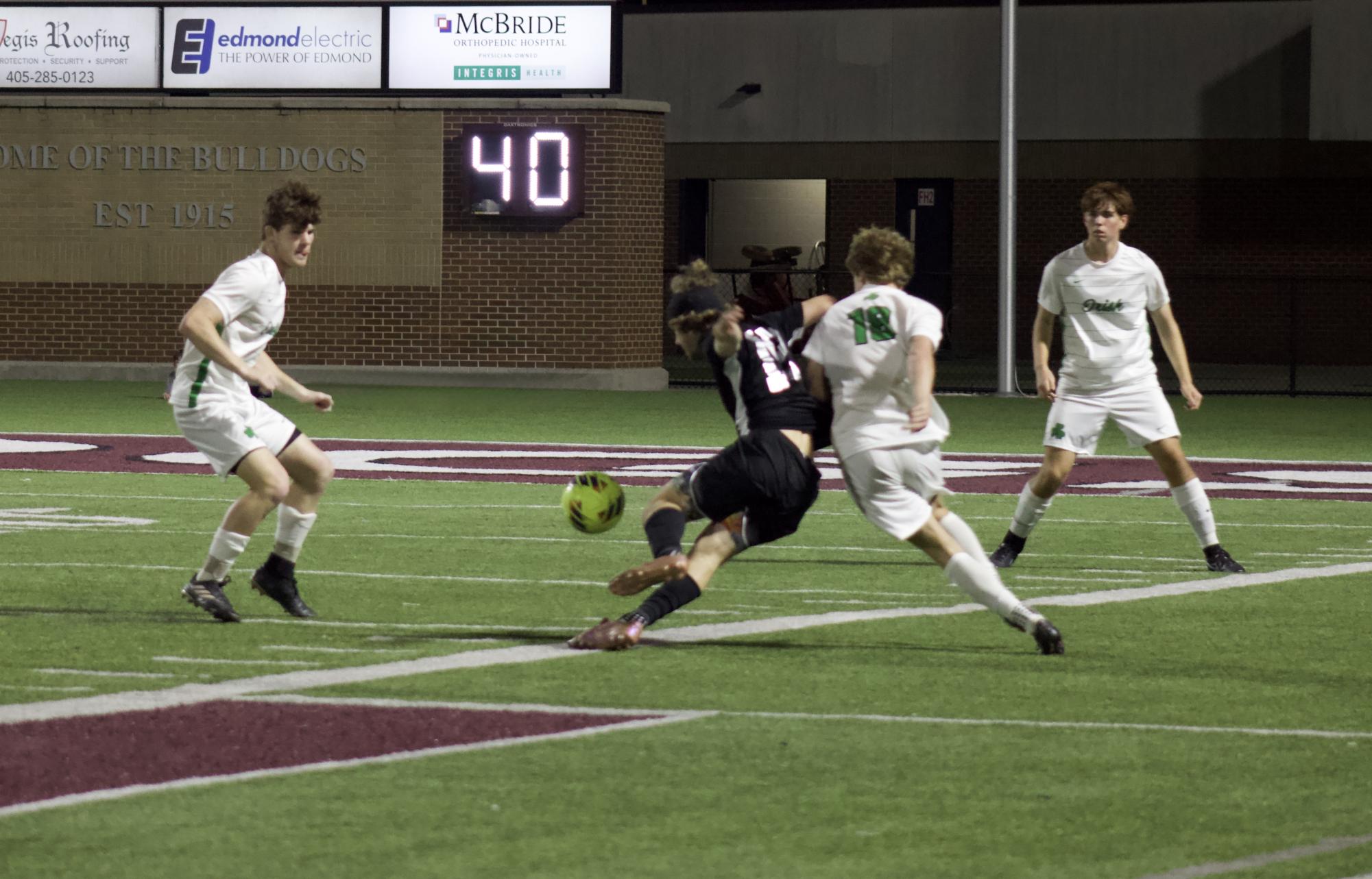 Varsity boys soccer versus Bishop McGuinness
