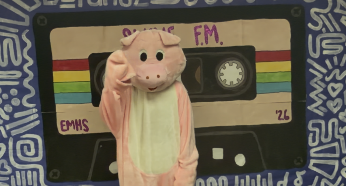 Swig the Pig waves to his beloved fans.