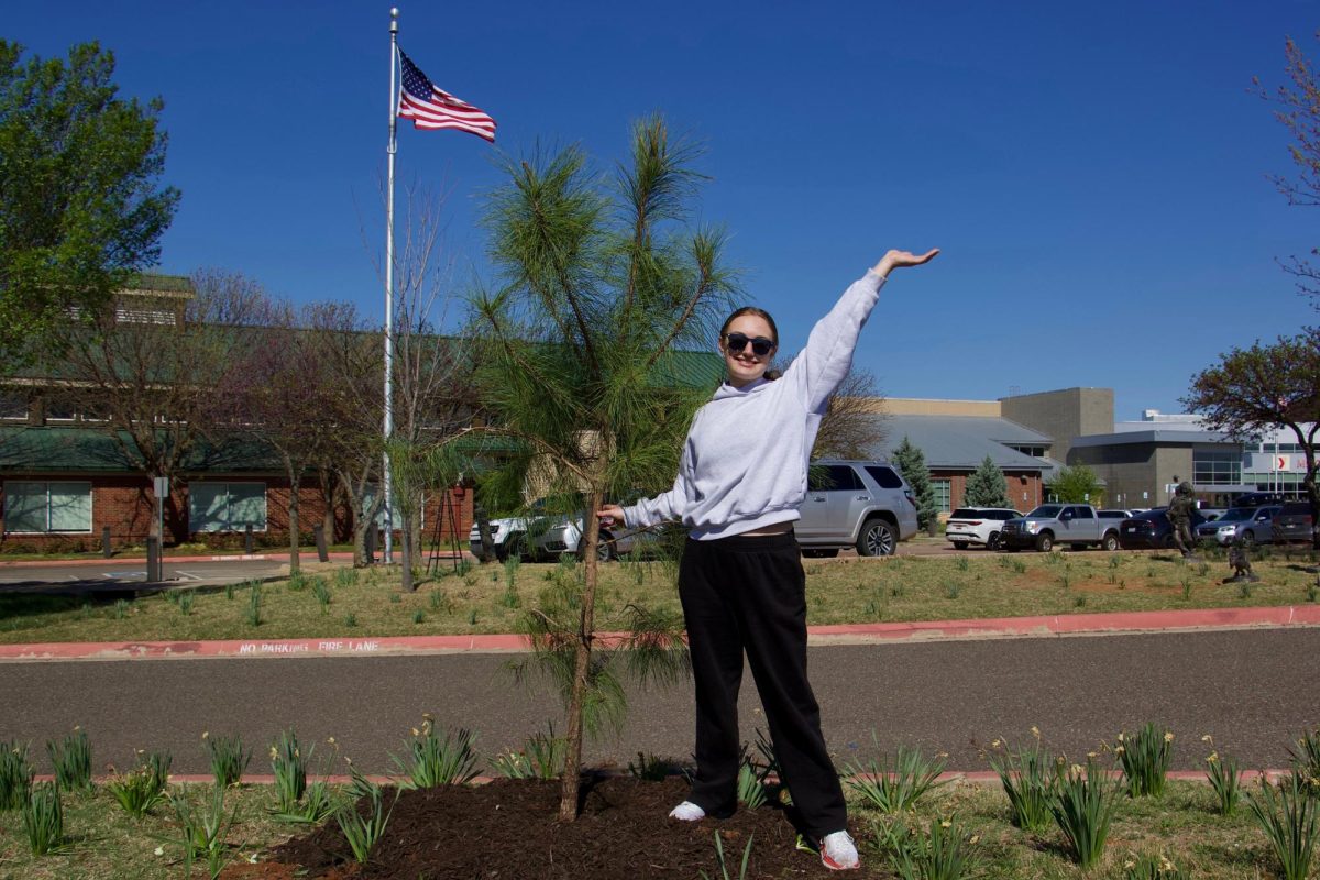 Anna Vitiello planted trees at Mitch Park to celebrate Arbor Day. 