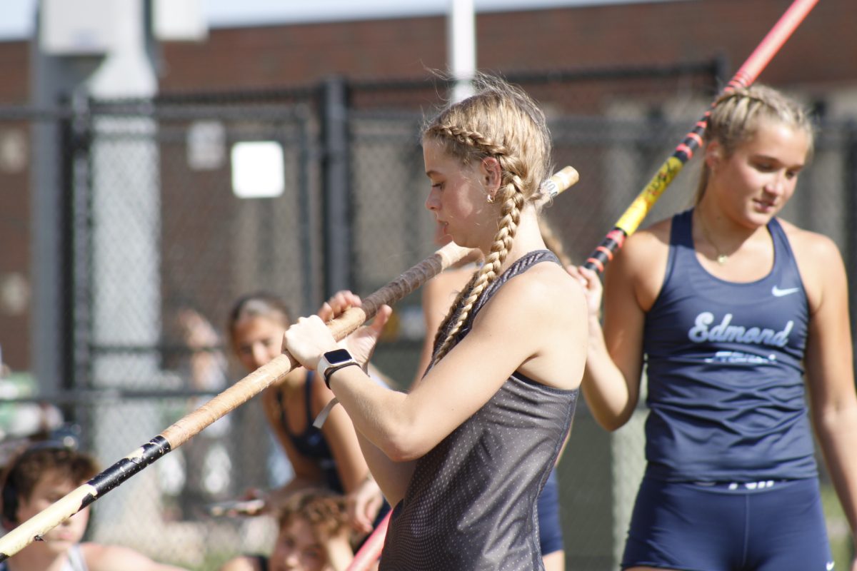 From Edmond Memorial girls track team, Sarah Robben warms up before she does the pole vault.
